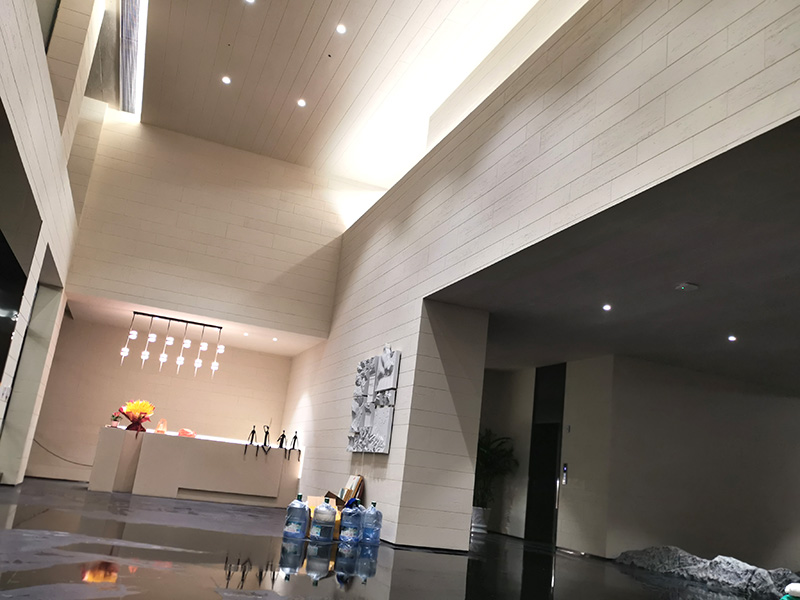 江西峡江林瑞石业前台洞石软瓷装修远景